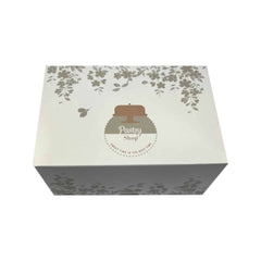 Süßwarenkarton mit der Aufschrift „PASTRY SHOP“